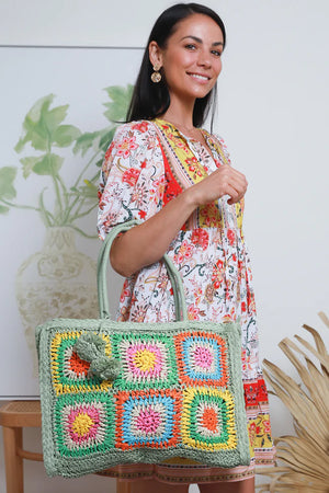 ISABELLA STRAW BAG WITH POM POM